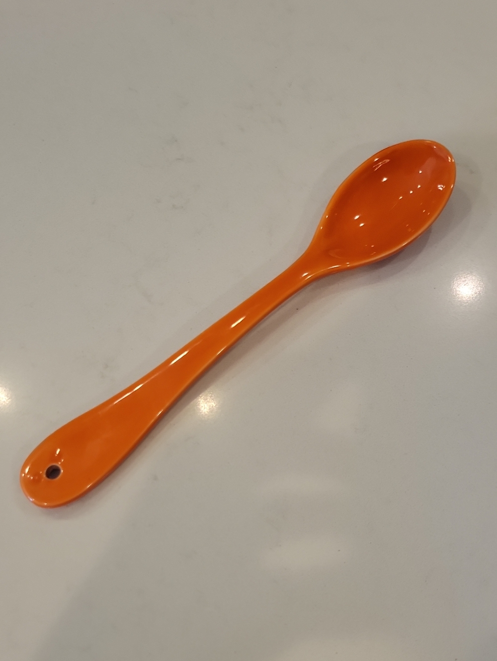 Anthropoligie Large Orange Spoon